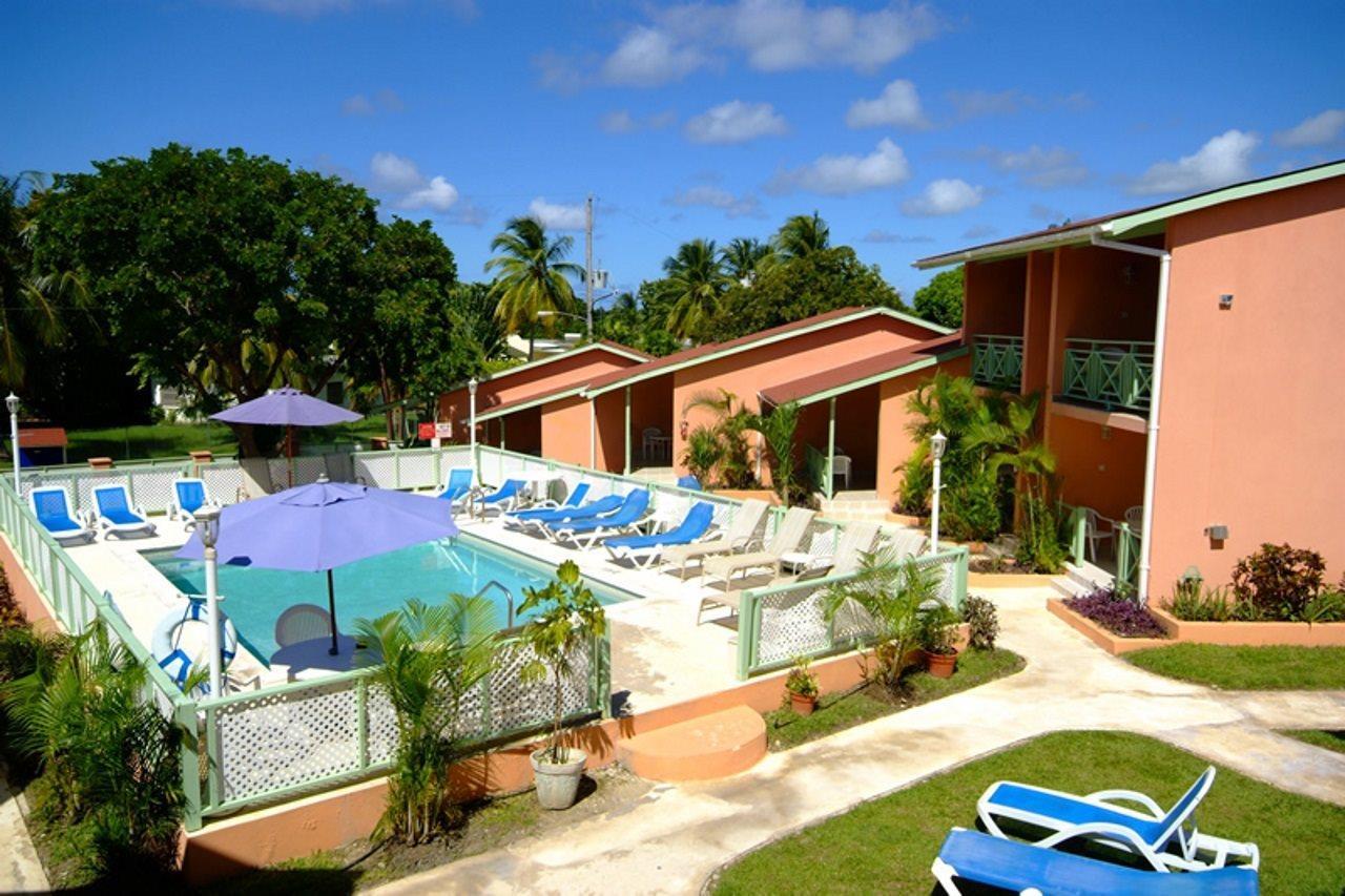 Apartamento Halcyon Palm Holetown Exterior foto